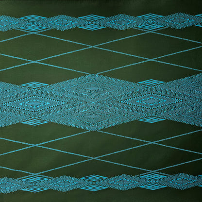 Textured green fabric with blue geometric patterns