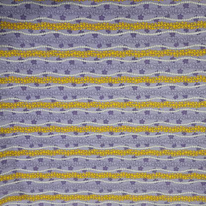 Patterned fabric with blue and yellow floral stripes on a purple background
