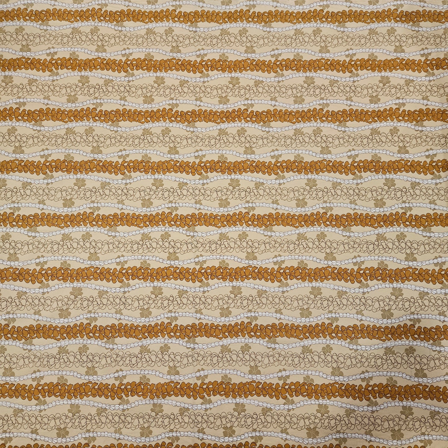 Fabric with brown and beige floral stripes on a neutral background