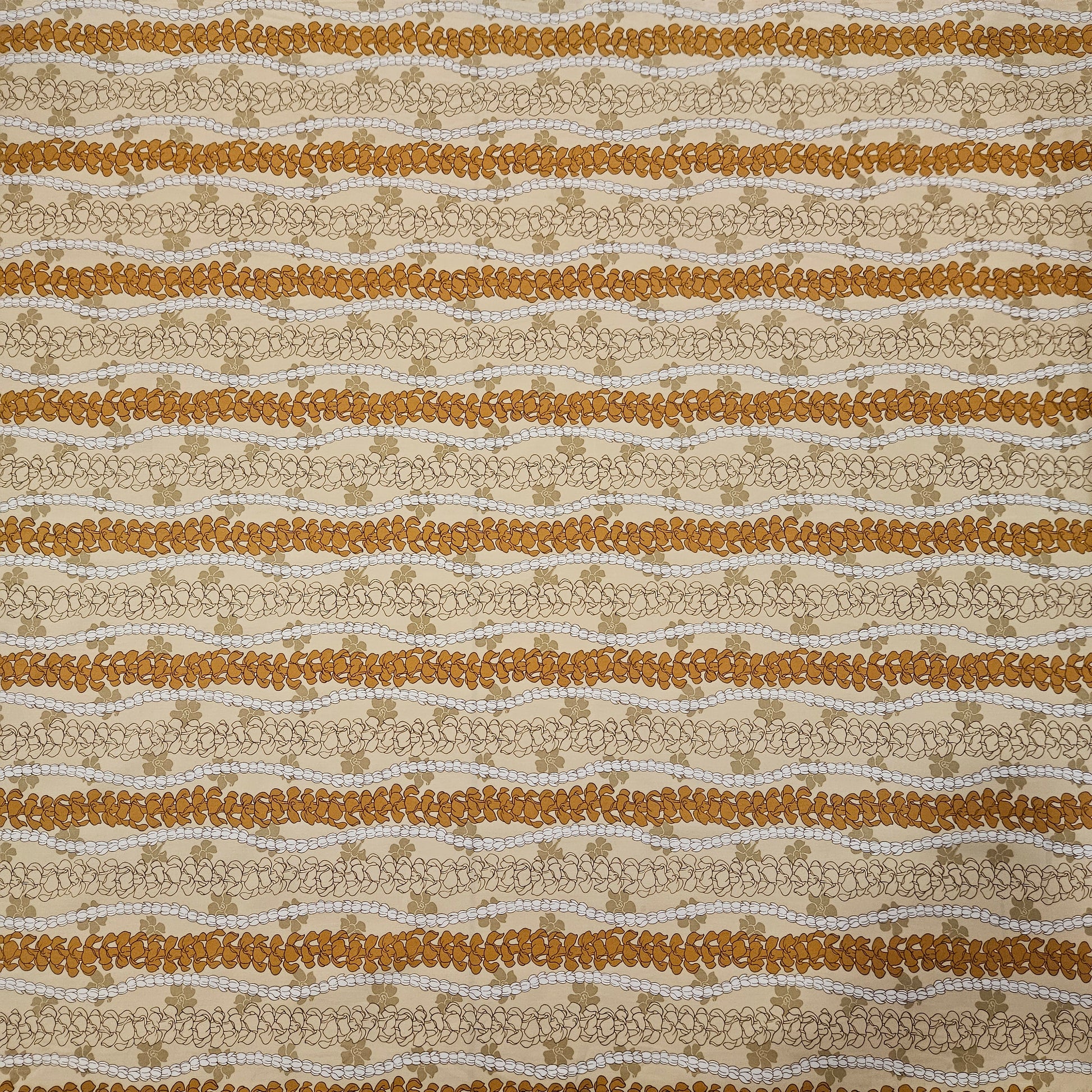 Fabric with brown and beige floral stripes on a neutral background