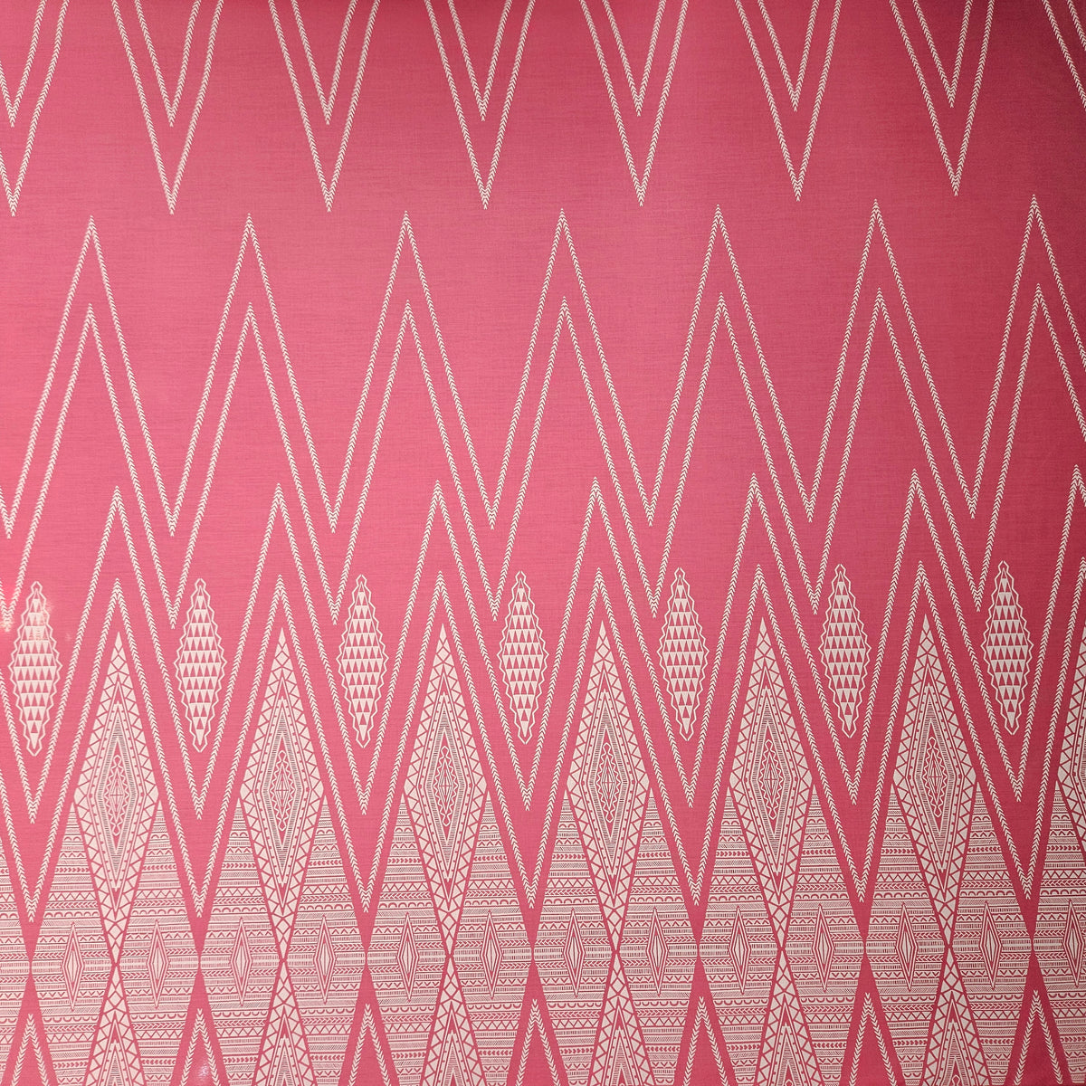 Geometric pattern with white triangles on a pink background