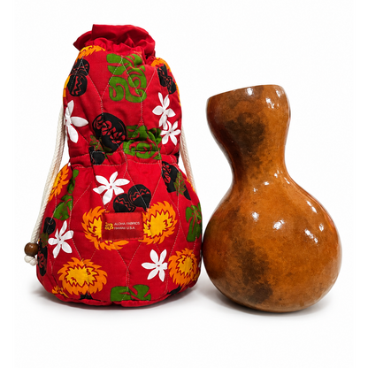 A red quilted drawstring bag with a floral print next to an ipu on a white background.